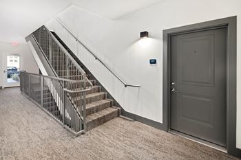 Staircase with a metal railing